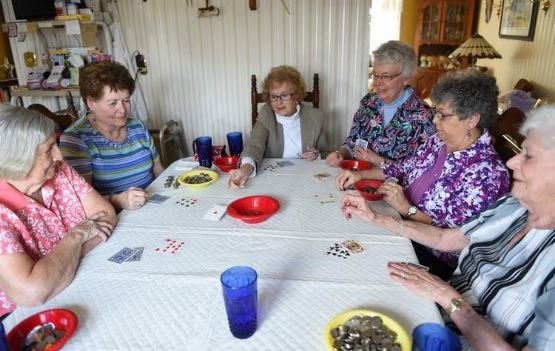 senior women playing poker