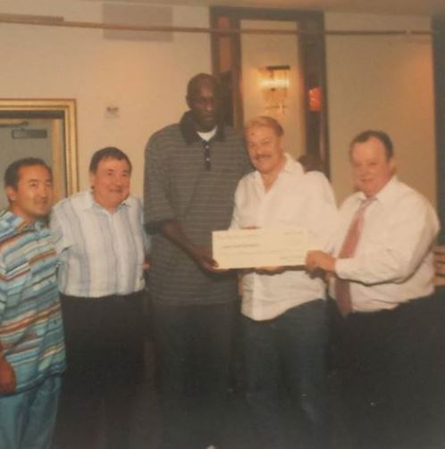 James Worthy Jerry Buss Robert Turner Yosh Nakano Frank Mariani