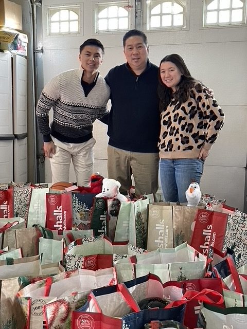 Bernard Lee gifts with Noah and Maya