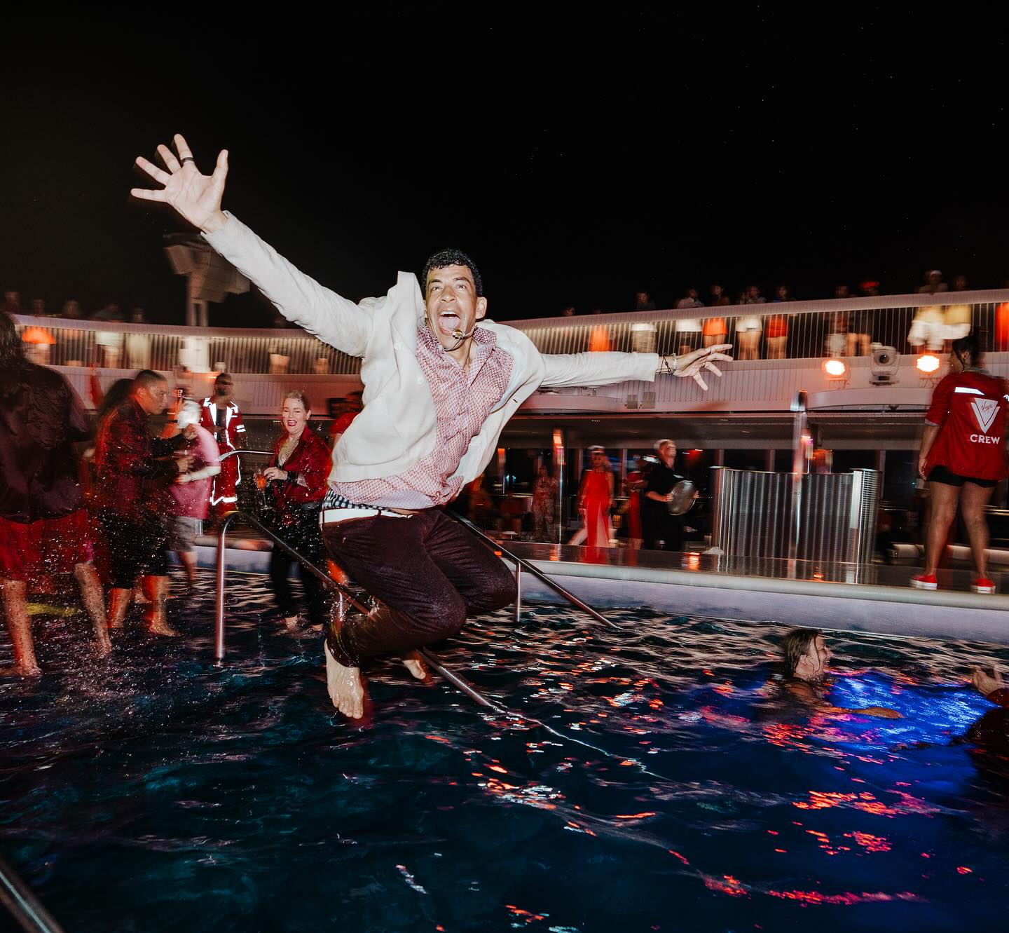 Adam Pliska jump into pool
